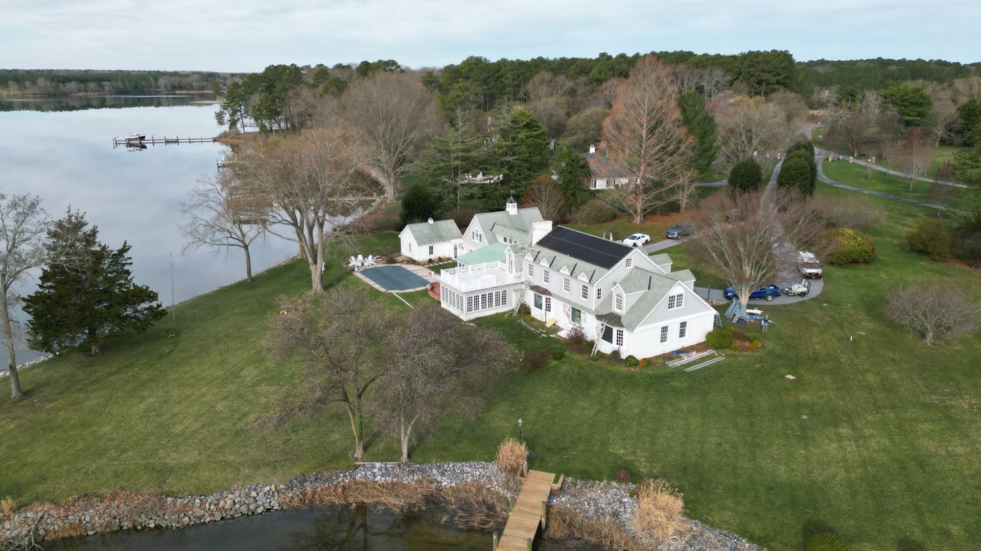 Aerial view of a large waterfront estate in Easton MD after a complete exterior soft wash by Coastal Shine.
