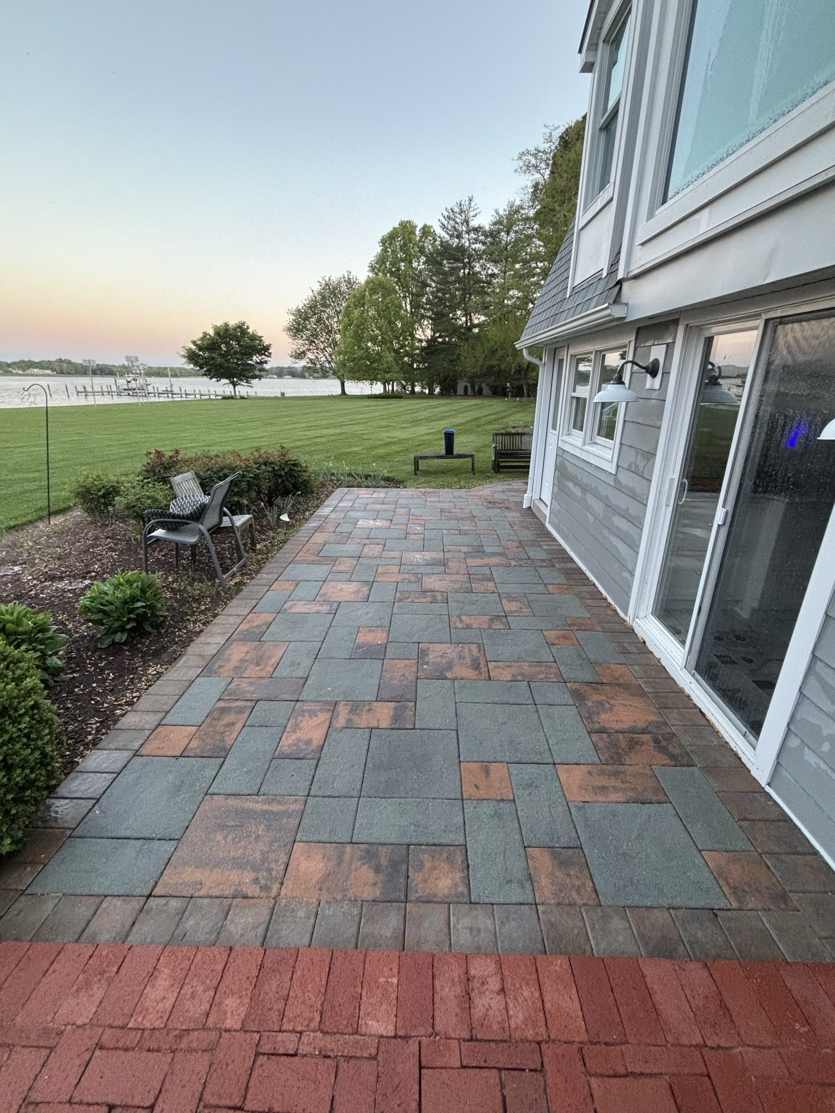 Clean multi-tone paver patio after pressure washing at a waterfront home near Easton MD on the Eastern Shore