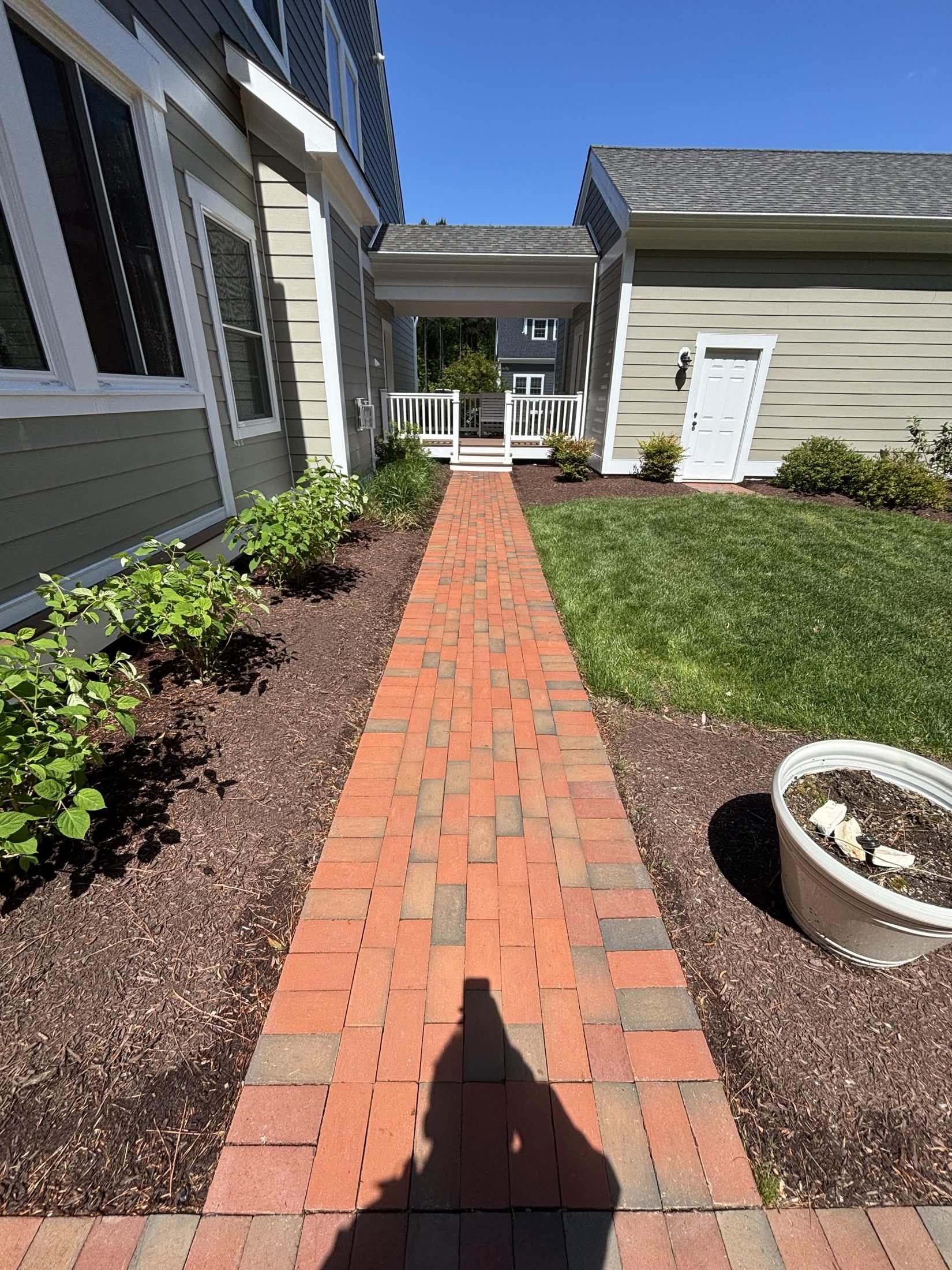 Clean brick paver walkway after pressure washing at an Easton MD home on Maryland's Eastern Shore